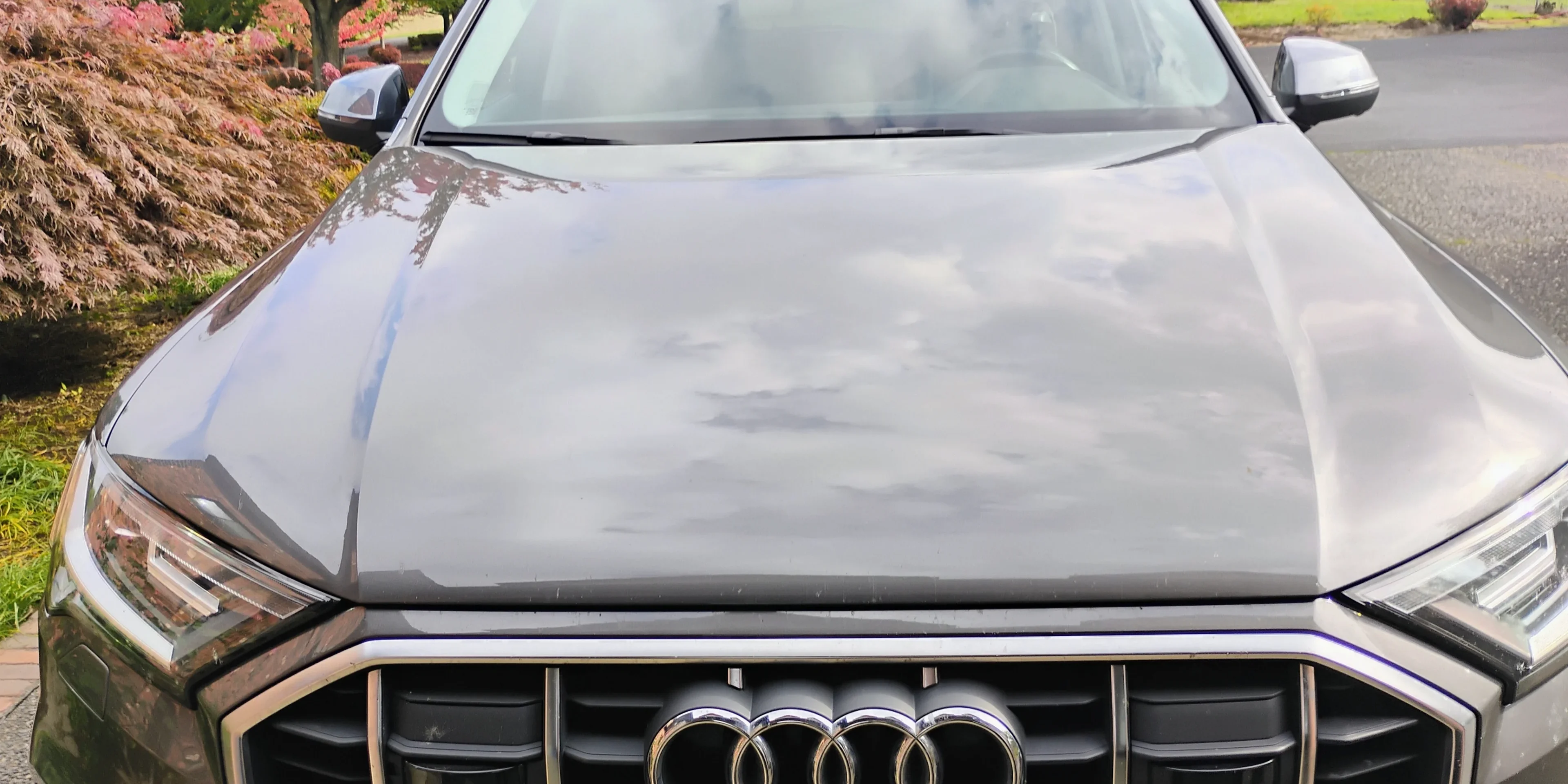 Front view of a silver Audi SUV.